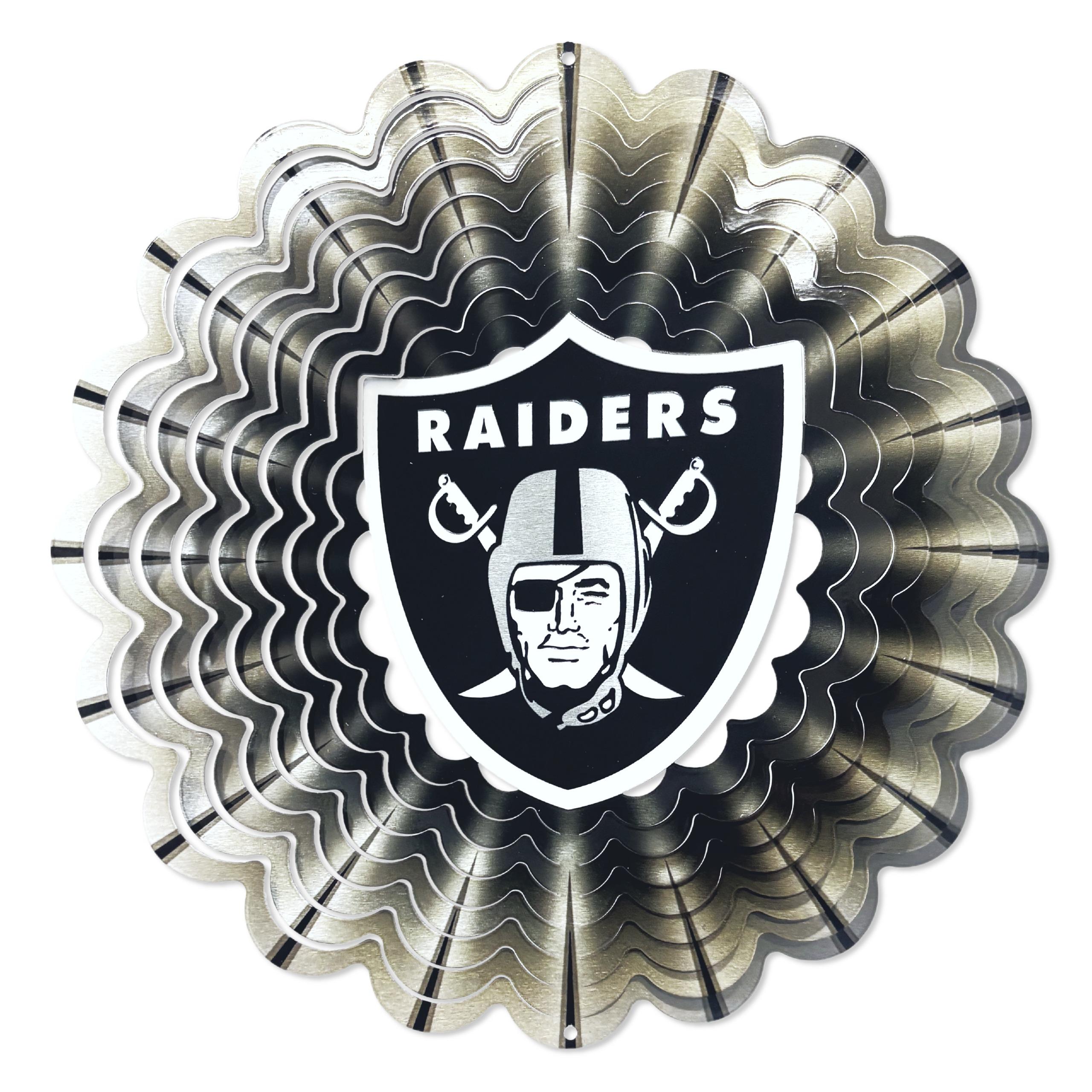 Las Vegas Raiders 12-inch wind spinner featuring bold team graphics, elegantly displayed in a garden setting with gentle breezes stirring it.