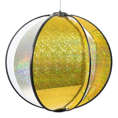 Laser Gold Spinning Globe features six glittering poly panels, designed to spin gently in the wind, displayed in a vibrant outdoor garden setting.