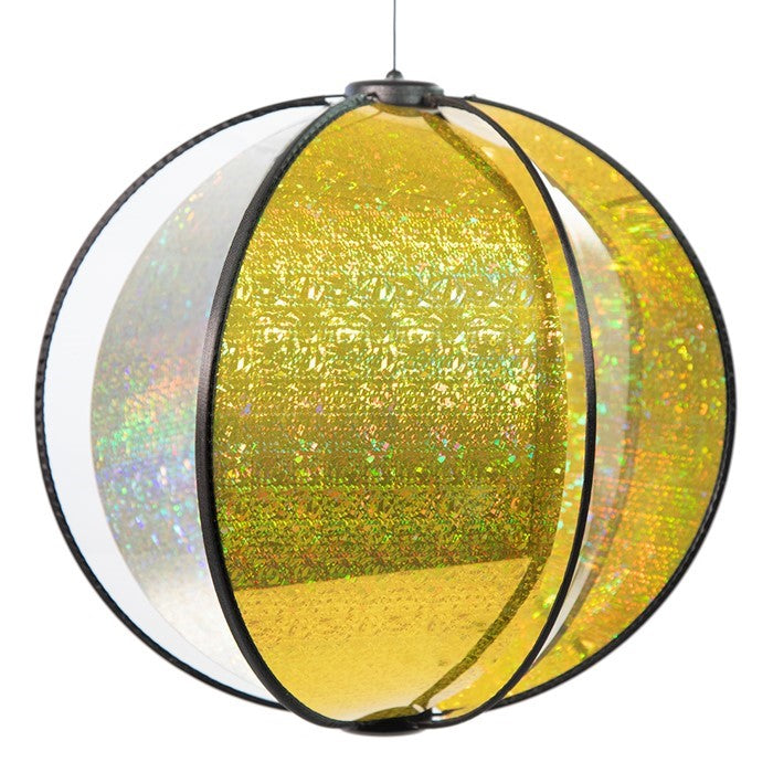 Laser Gold Spinning Globe features six glittering poly panels, designed to spin gently in the wind, displayed in a vibrant outdoor garden setting.