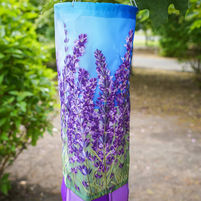 Lavender 40' Inspiration Windsock featuring vibrant colors and detailed designs, gracefully hanging outdoors ready to catch the breeze.