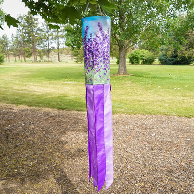 Lavender 40' Inspiration Windsock featuring vibrant colors and detailed designs, gracefully hanging outdoors ready to catch the breeze.