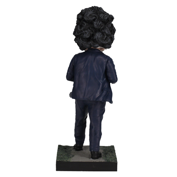 Leatherface - Pretty Woman Mask Bobblehead standing 8 inches tall, featuring detailed human skin mask design in a horror-themed display.