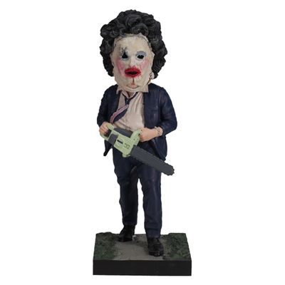 Leatherface - Pretty Woman Mask Bobblehead standing 8 inches tall, featuring detailed human skin mask design in a horror-themed display.