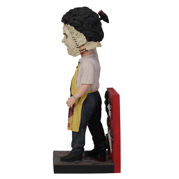 Leatherface - Killing Mask Bobblehead showcasing a detailed design of the character with a human skin mask, approximately 8 inches tall.
