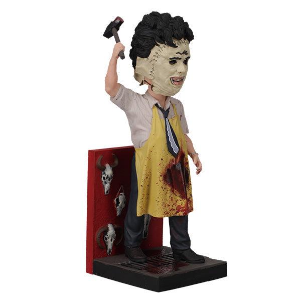 Leatherface - Killing Mask Bobblehead showcasing a detailed design of the character with a human skin mask, approximately 8 inches tall.