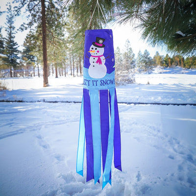 Let It Snow windsock featuring a cheerful snowman design with fluttering tails, perfect for festive winter outdoor decor that adds seasonal charm.