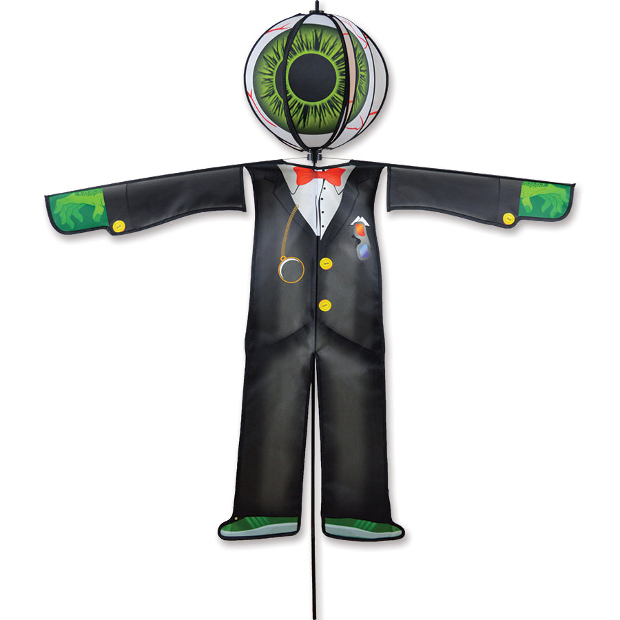 Lg. Spinning Friend - Eyeball Monster garden spinner with colorful eyeball design, displayed outside spinning in the breeze during Halloween decorations.