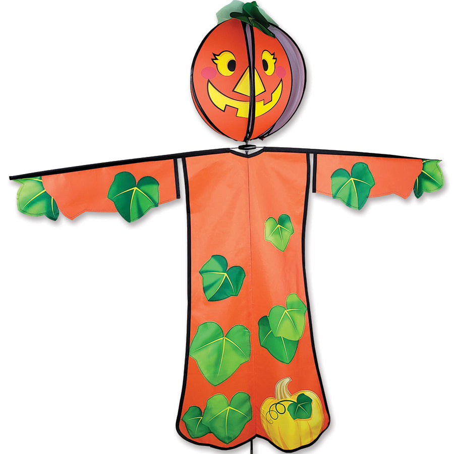 Lg. Spinning Friend - Patty Pumpkin outdoor decoration with a spinning pumpkin head, perfect for Halloween festivities in a garden setting.