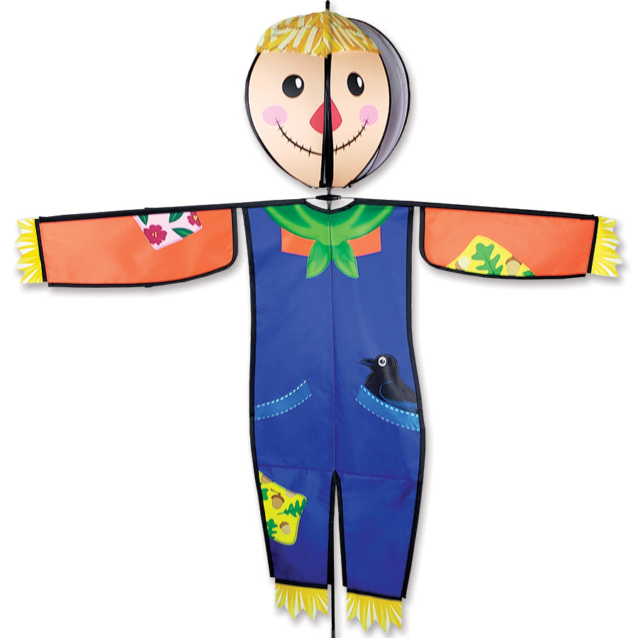 Lg. Spinning Friend - Sammy Scarecrow outdoor decoration with a spinning head, displayed in a backyard surrounded by fall foliage.