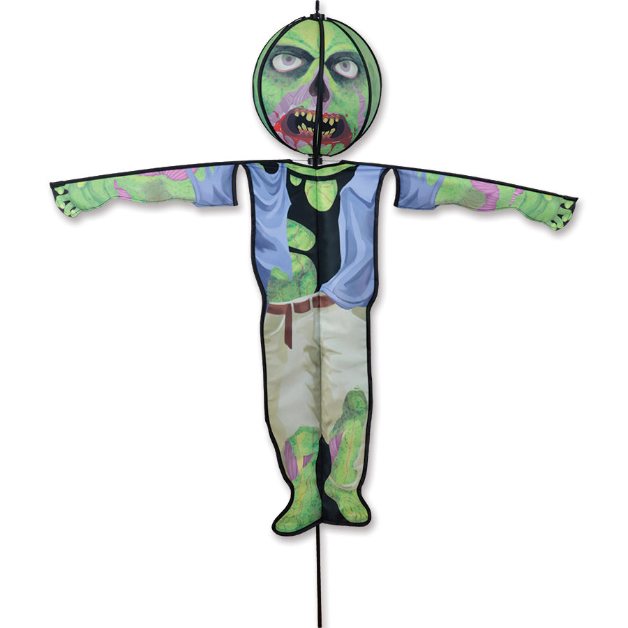 Lg. Spinning Friend - Zombie Halloween outdoor spinner with a spooky character head, engagingly displayed in a garden setting with a gentle breeze.