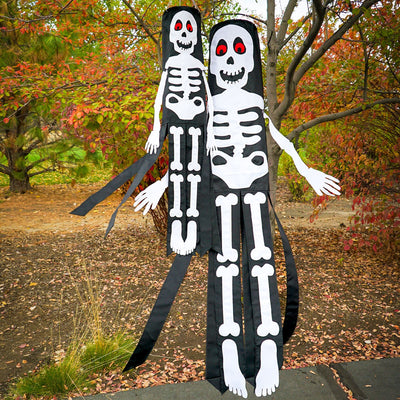 Lil' Bones Skeleton 3D windsock, 40 inches long, featuring playful applique skeleton bones and vibrant fluttering tails against a backdrop of blue sky.