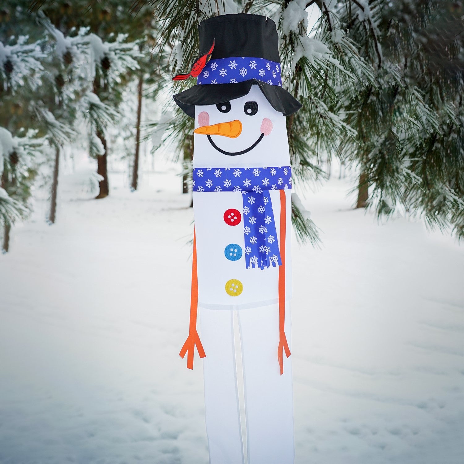 Lil' Snowman 3D 40-inch windsock with a playful snowman design and colorful tails, hanging outdoors in a winter setting.