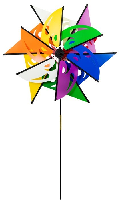 Mardi Gras Ground Spinner with colorful butterfly windsail, positioned in a garden setting, spinning gently in the breeze.
