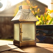 Medium Hammered Metal Square Glass Tealight Lantern featuring textured glass panels and an antiqued brass top, suitable for tea light candles.