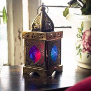 Medium Pink & Teal Square Glass Tealight Lantern showcasing intricate design, placed on a patio table with tealight candle inside.