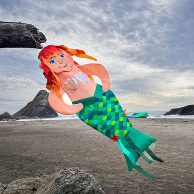 Mermaid Wind Friend 3D hanging decor displayed outdoors, featuring detailed embroidery and vibrant colors fluttering in the breeze.