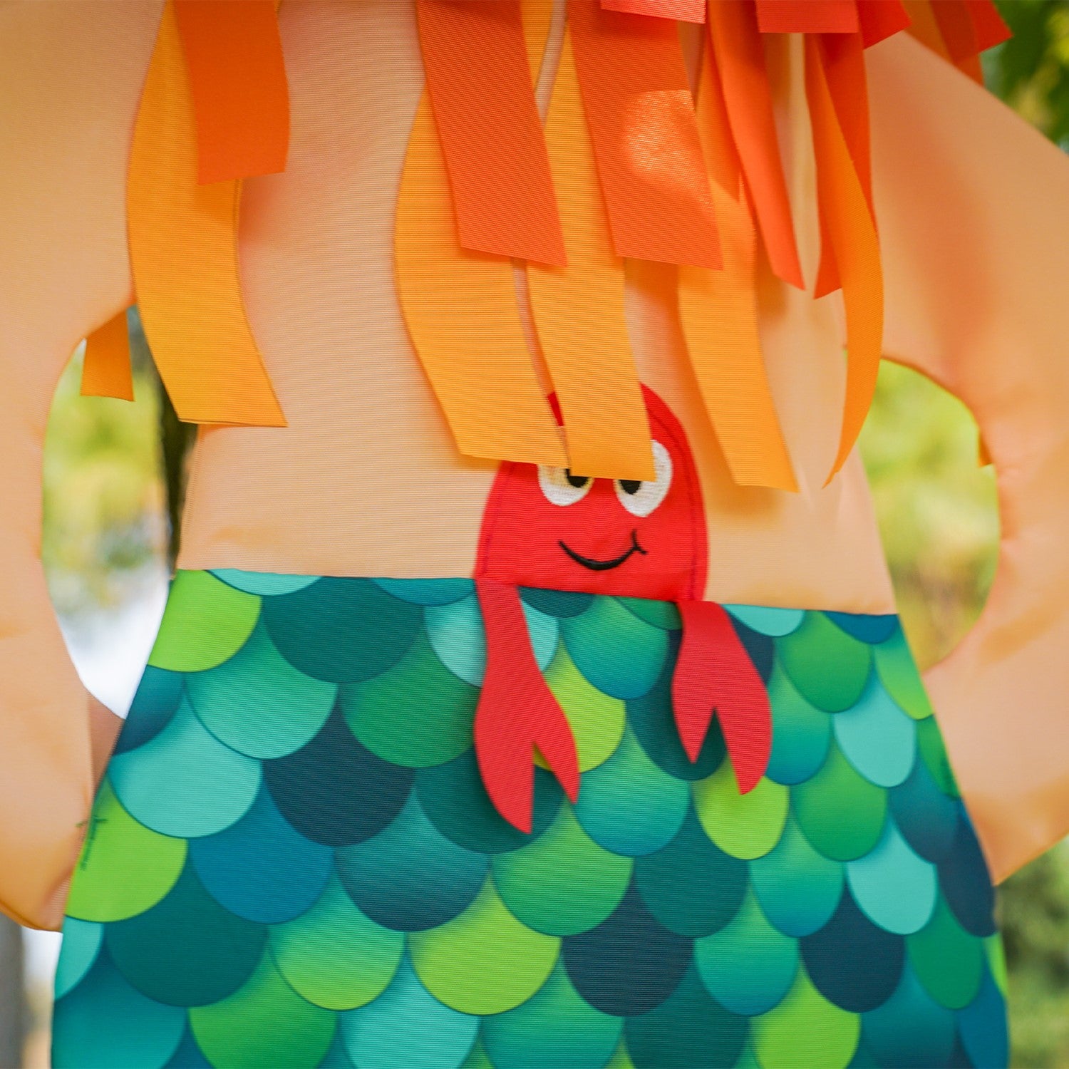 Mermaid Wind Friend 3D hanging decor displayed outdoors, featuring detailed embroidery and vibrant colors fluttering in the breeze.