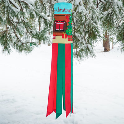 Merry Christmas 40" Windsock featuring a jolly Santa design with colorful tails fluttering in the breeze, ideal for festive outdoor decoration.