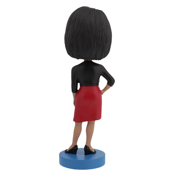 Michelle Obama Bobblehead standing 7 inches tall, showcasing a confident and elegant likeness of the First Lady, ideal for display.