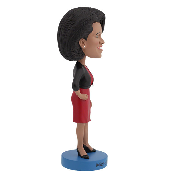 Michelle Obama Bobblehead standing 7 inches tall, showcasing a confident and elegant likeness of the First Lady, ideal for display.