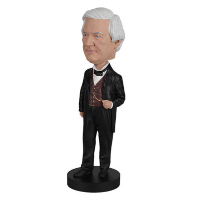 Millard Fillmore bobblehead featuring intricate details and traditional attire, perfect for collectors and history enthusiasts, displayed in a home setting.