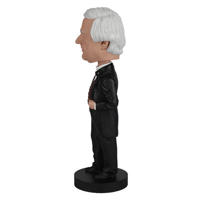 Millard Fillmore bobblehead featuring intricate details and traditional attire, perfect for collectors and history enthusiasts, displayed in a home setting.