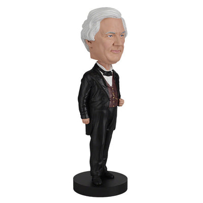 Millard Fillmore bobblehead featuring intricate details and traditional attire, perfect for collectors and history enthusiasts, displayed in a home setting.