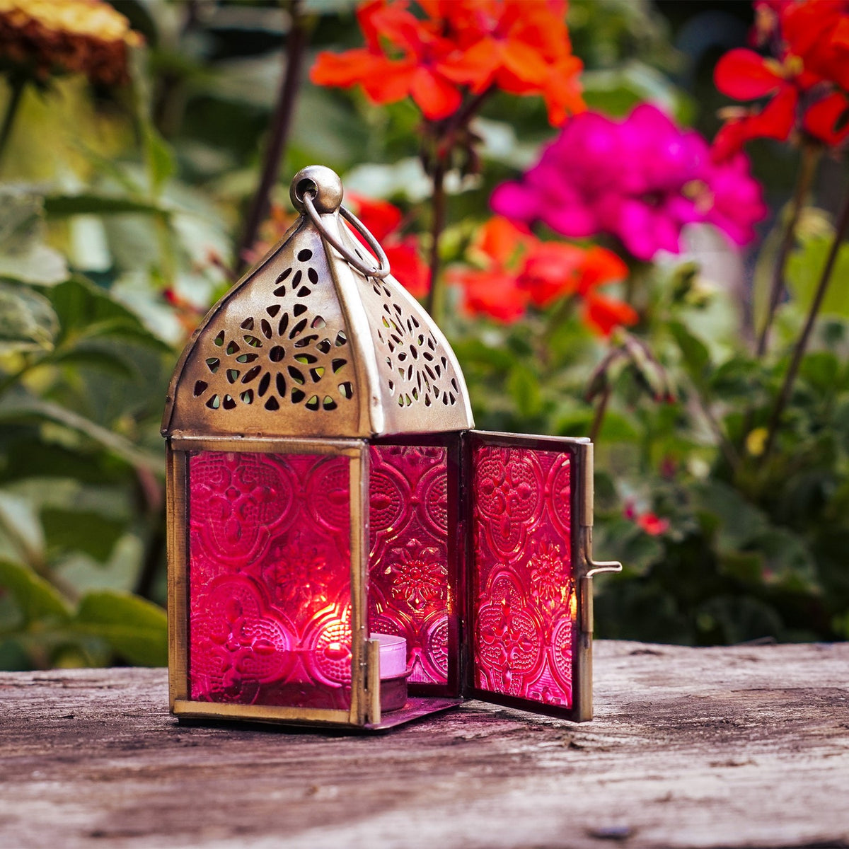 Mini Pink Square Glass Tealight Lantern with textured glass and metal accents, beautifully lit and displayed on a cozy table setting.