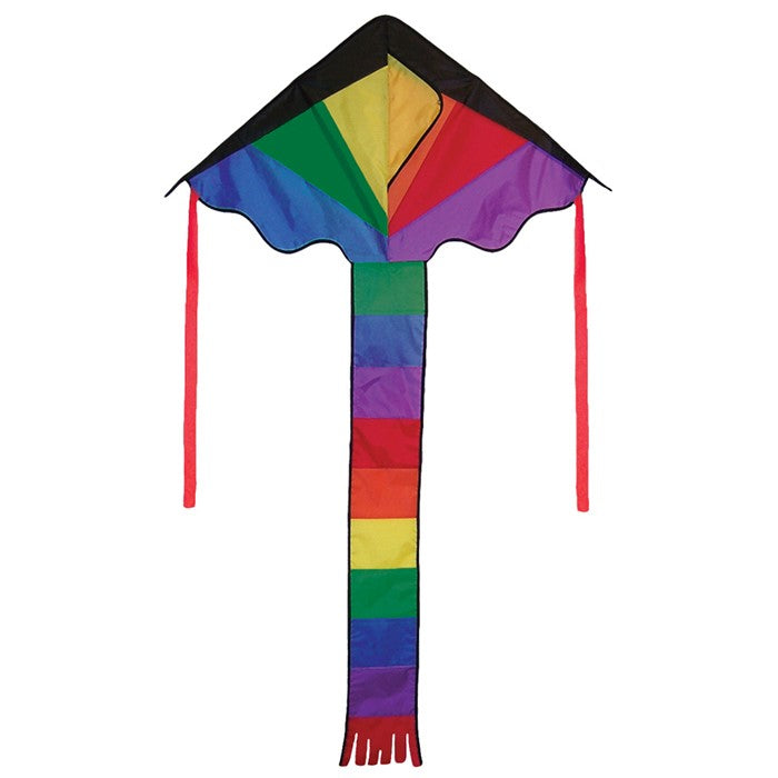 Brightly colored Mini Rainbow Fly-Hi Kite featuring a rainbow design flying in blue sky with streamer tails trailing behind it.