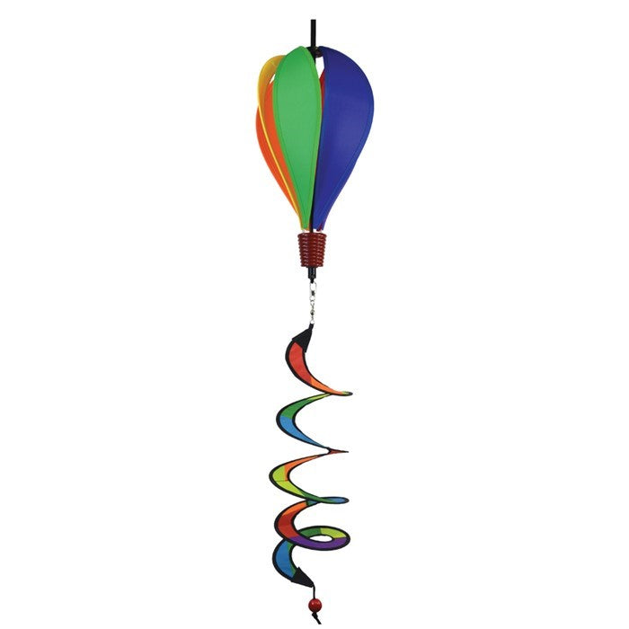 Mini Rainbow Hot Air Balloon spinner featuring colorful panels in a garden setting, designed to spin and delight in light breezes.