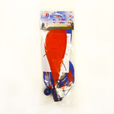 Mini Red, White, and Blue Hot Air Balloon with curlie tail displayed in a garden setting, adding a festive patriotic touch.