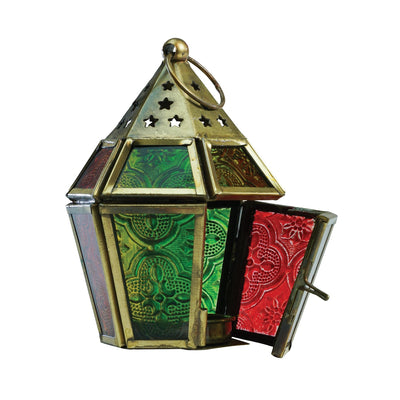 Mini Red, Yellow & Green Hex Glass Tealight Lantern showcasing vibrant colors with intricate metal accents, designed for tealights, hanging in an outdoor setting.