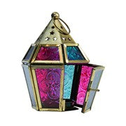 Mini Teal & Pink Hex Glass Tealight Lantern with textured glass and metal accents, radiating warm light in a cozy indoor setting.