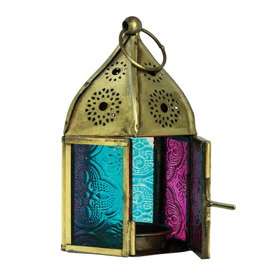 Mini Teal & Pink Pentagon Glass Tealight Lantern showcasing a vibrant design with textured glass panels and metal accents in a cozy indoor setting.