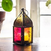 Mini Yellow & Pink Pentagon Glass Tealight Lantern showcasing vibrant colors and intricate designs to illuminate any setting beautifully.