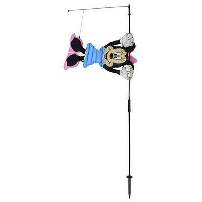 Minnie Mouse WindSical garden flag floats gracefully on a fiberglass pole, featuring vibrant colors and Minnie Mouse design in an outdoor setting.