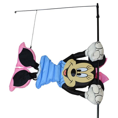 Minnie Mouse WindSical garden flag floats gracefully on a fiberglass pole, featuring vibrant colors and Minnie Mouse design in an outdoor setting.