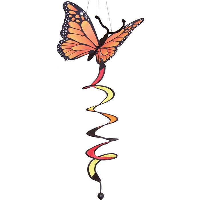 Monarch Butterfly Theme Twister featuring moveable wings and a curlie tail, hanging gracefully in a vibrant outdoor garden setting.