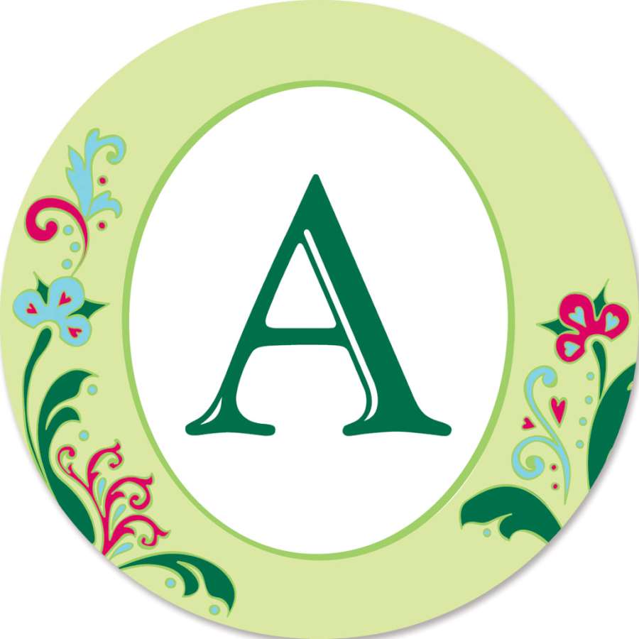 Monogram Triple Spinner - A, featuring a personalized 'A', rotating gracefully in a colorful garden setting with sunlight filtering through.