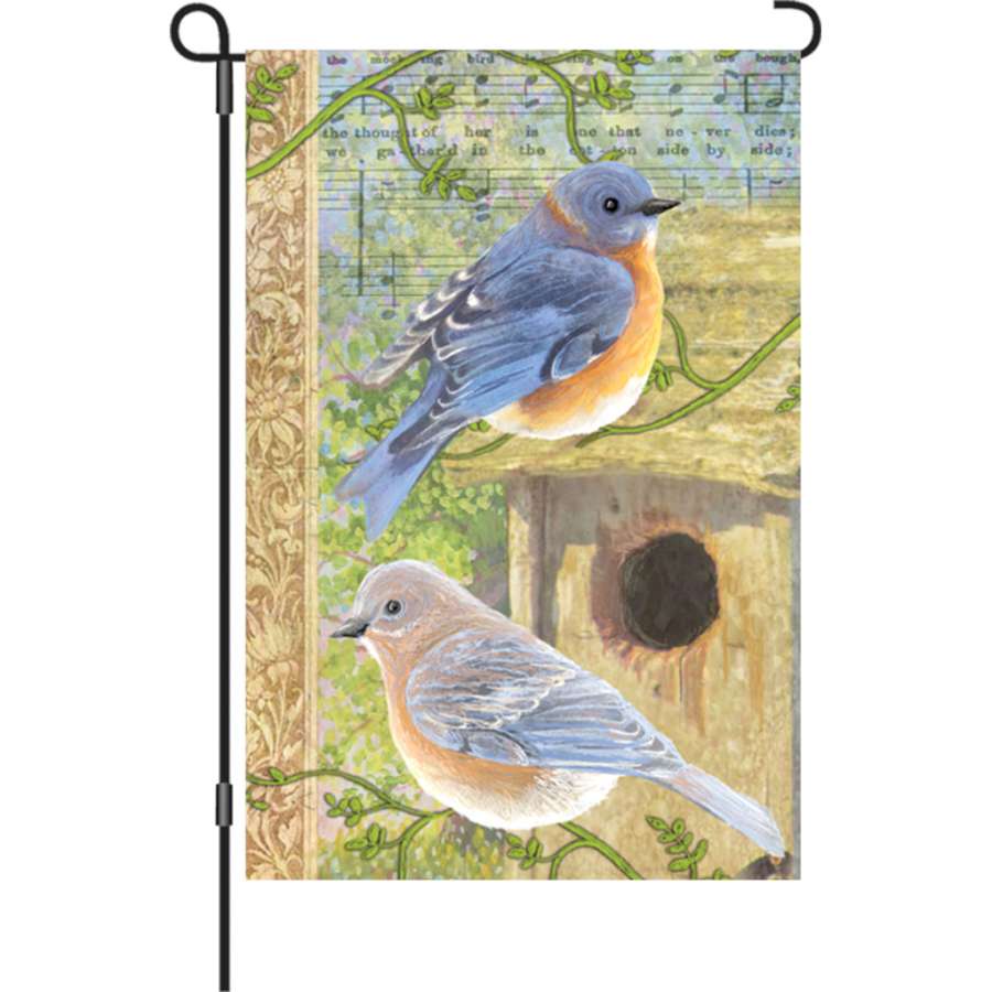 12 in. garden flag featuring illuminated musical bluebirds surrounded by flowers, brightly colored and designed for outdoor display.