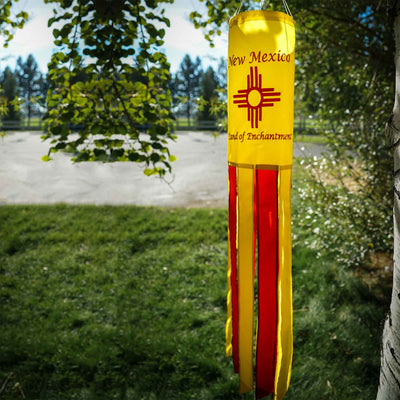 New Mexico 40 inch windsock displaying colorful appliqued graphics and fluttering tails against a backdrop of blue sky.