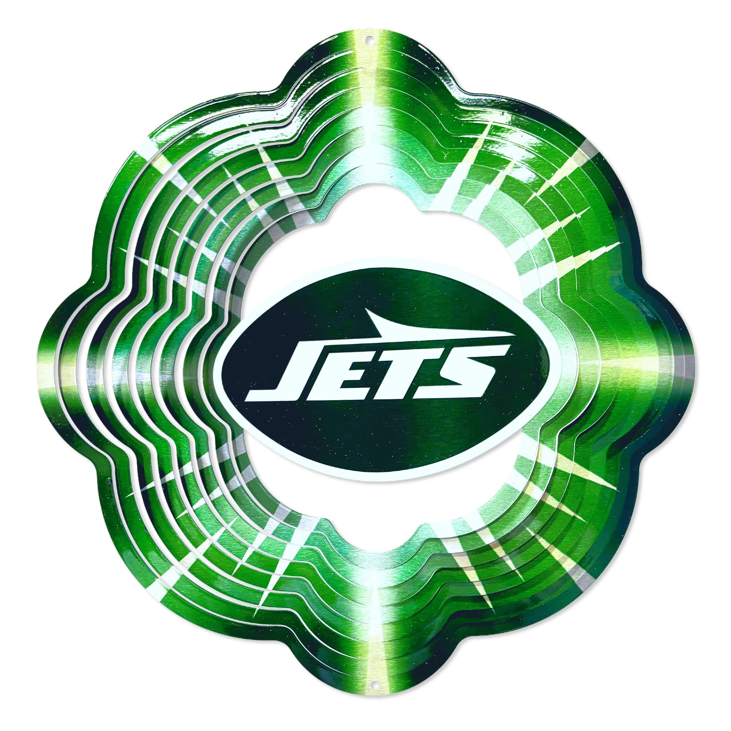 New York Jets 12-inch wind spinner with bold team graphics spinning gracefully in a garden setting under a clear sky.
