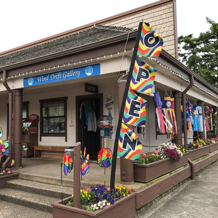 Open 17" x 82" feather banner with vivid dye-sublimated print for dual-sided visibility, featuring durable construction designed for outdoor use.