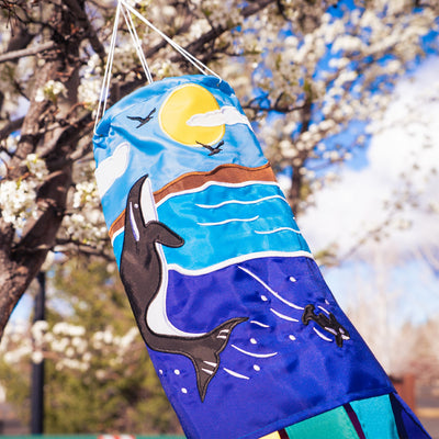 Orca Whale 40-inch windsock featuring colorful appliqued graphics and embroidered details, elegantly displayed outdoors.