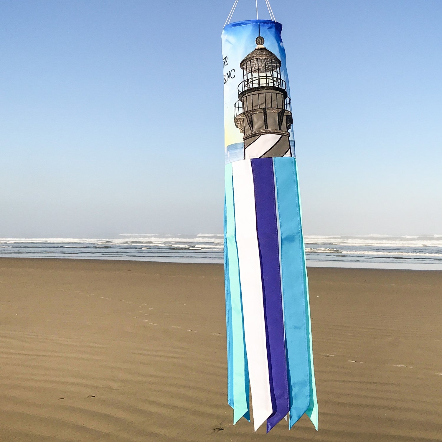 The Outer Banks 40" Windsock showcases a colorful lighthouse design with eight fluttering tails, perfect for adding a coastal touch to any outdoor space.