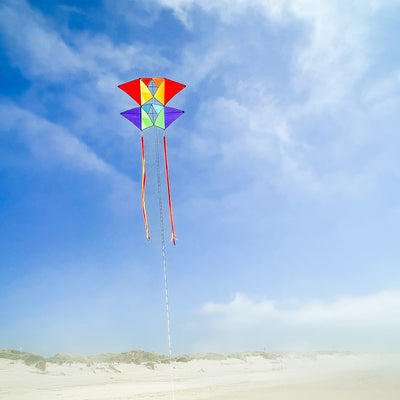 Pacific Tri-Kite featuring a vibrant design and durable materials, ready to fly easily and effectively for outdoor fun in various wind conditions.