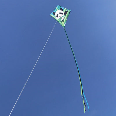 Panda 30" Diamond Kite flying high in a clear blue sky, showcasing its vibrant panda bear design and colorful tails, perfect for outdoor fun.