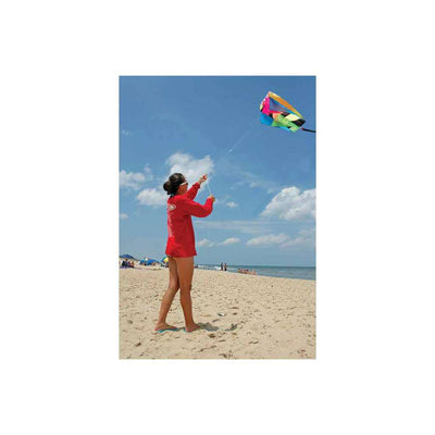 Neon Parafoil 5 Kite in the sky, measuring 20x32 inches, showcasing its bright colors and 5-streamer tail while flying outdoors.