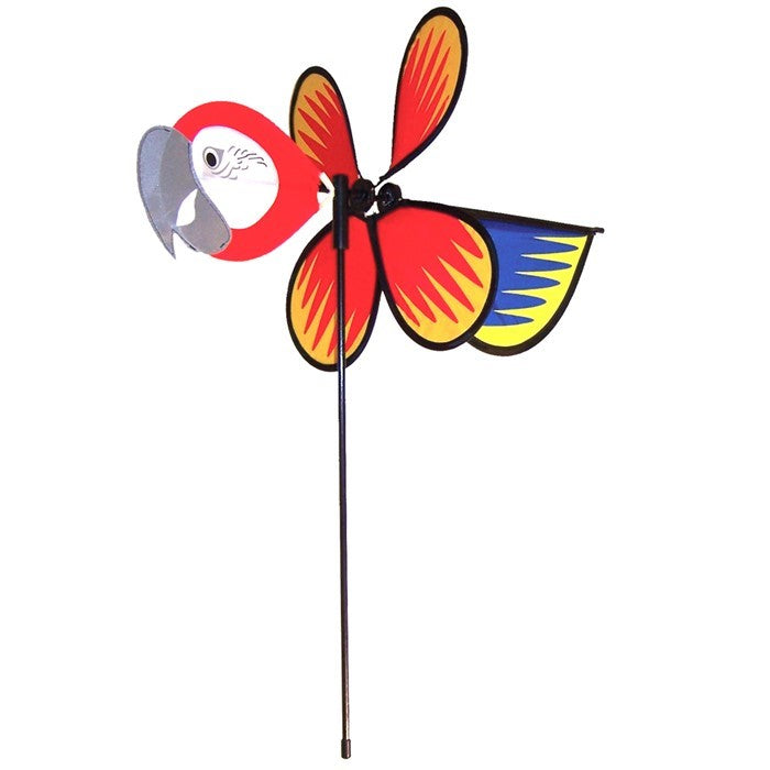 Parrot Baby Spinner featuring bright colors and detailed graphics, spinning easily on a 17-inch fiberglass pole in a garden setting.