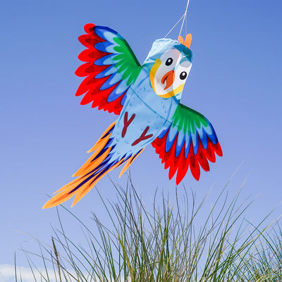 Colorful Parrot Windsock with outstretched wings gracefully hanging outdoors, bringing vibrancy to the garden decor.